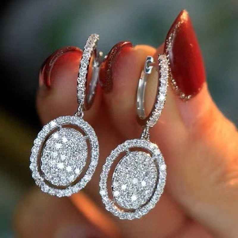 Orecchini ovali in oro bianco - Eleganza alla moda per ogni occasione