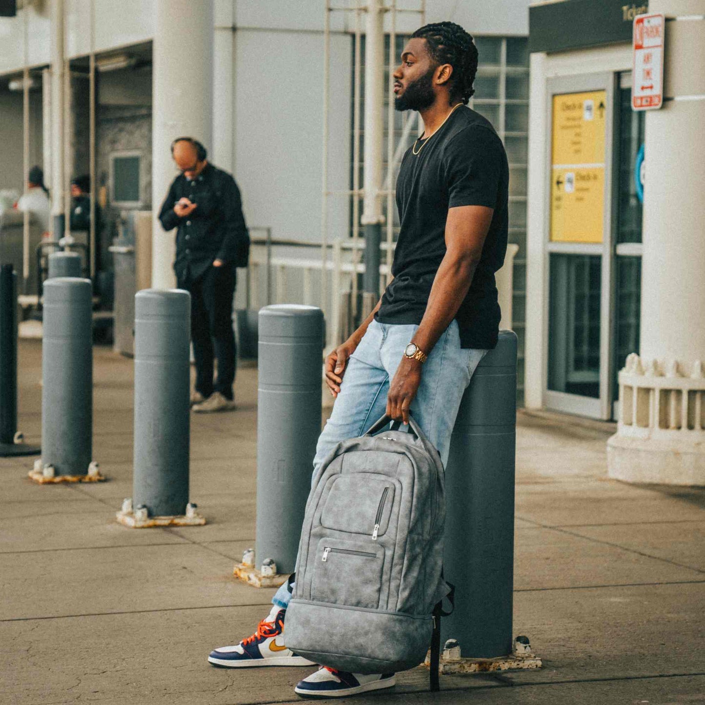 Grey Leather Carry-On Patented Backpack