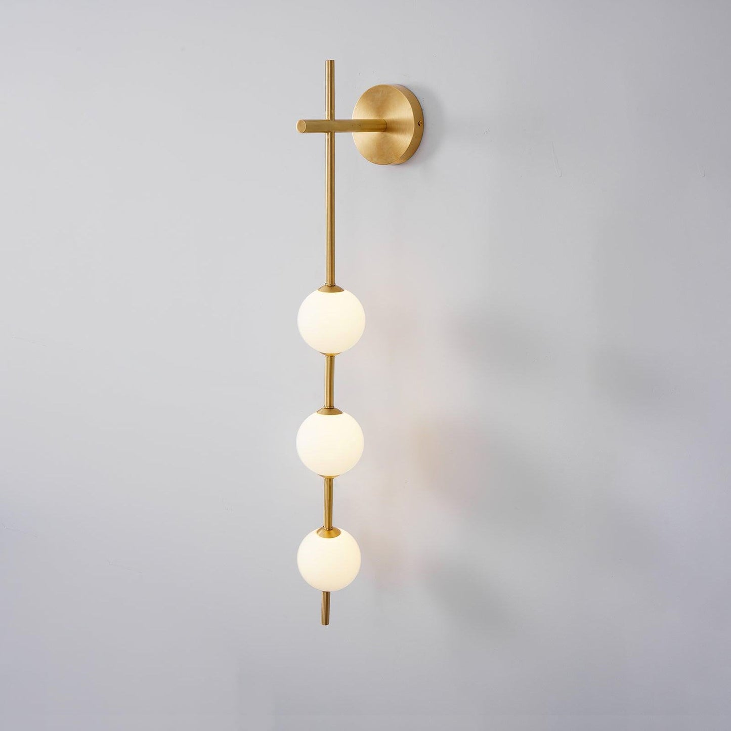 Vertical Glass Globe Wall Sconce | Dimmable Stylish Lighting with Gold Finish 14