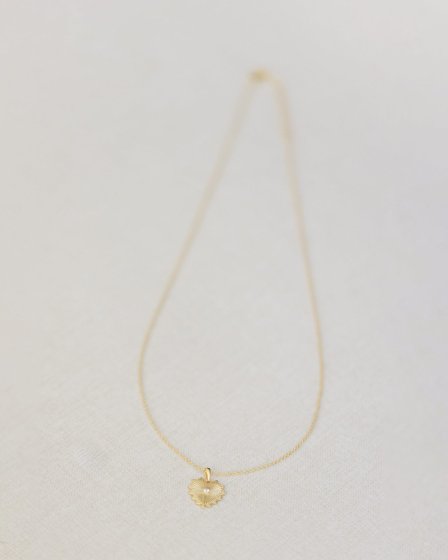 Halsband med hjärta i guld och diamant