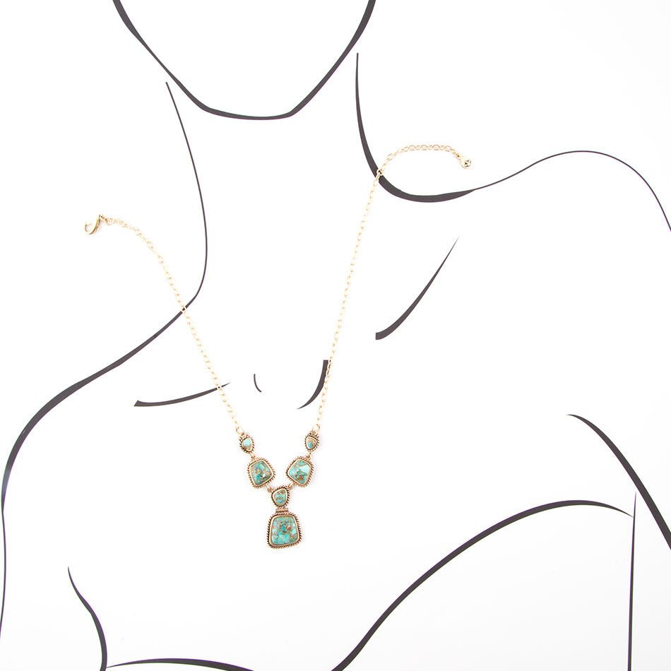 Collana dorata con turchese blu cielo e terra