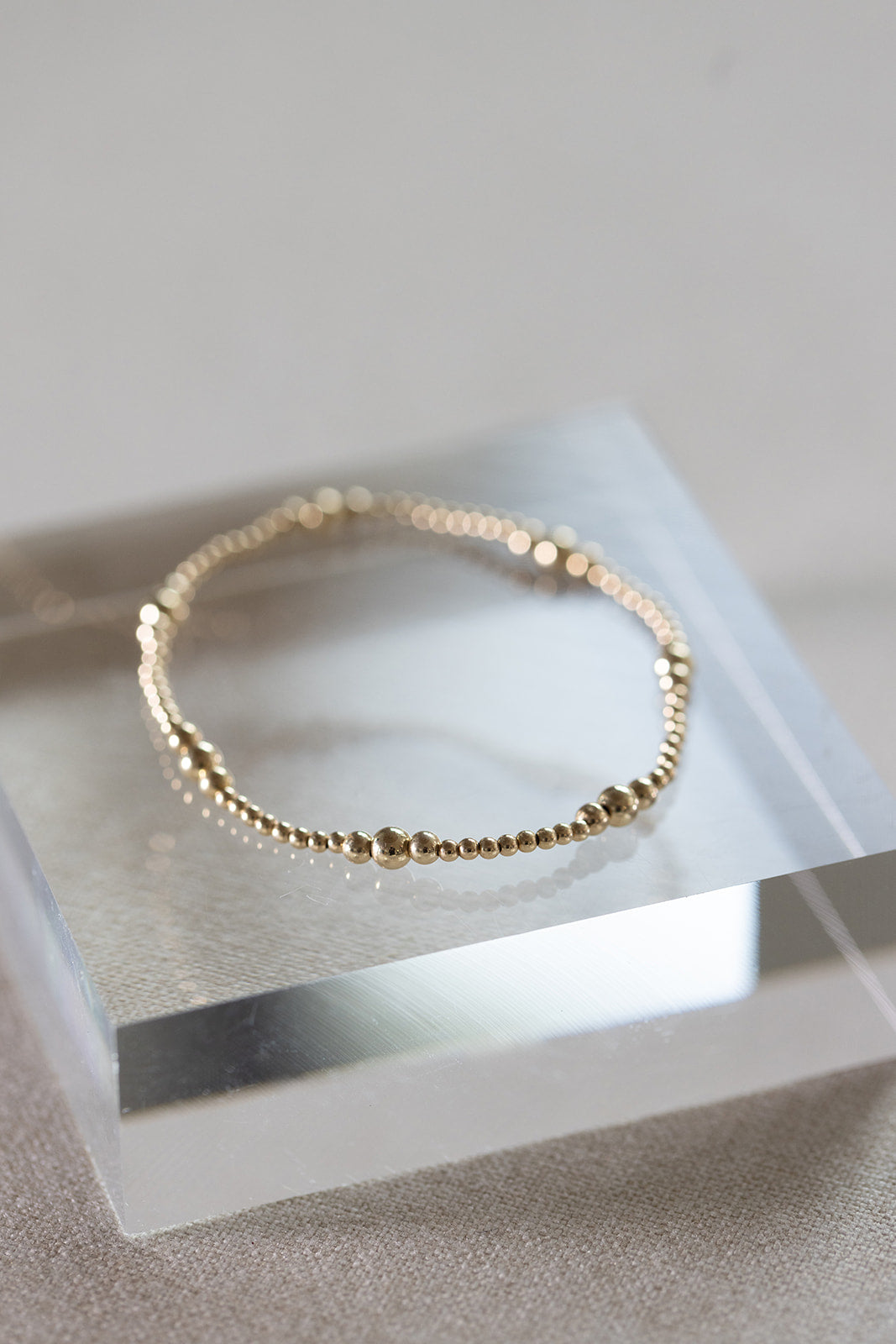 Guld Satellitarmband