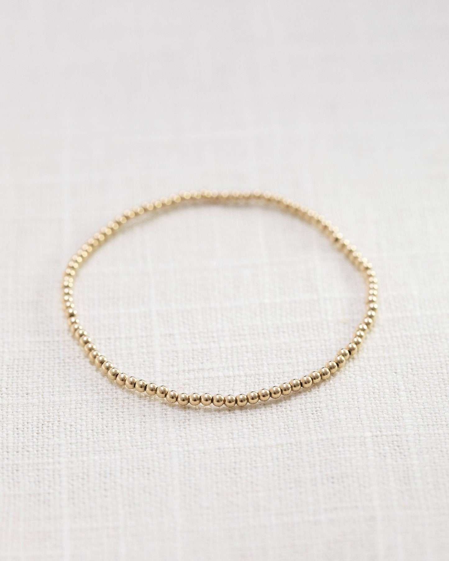 2mm guldklot armband