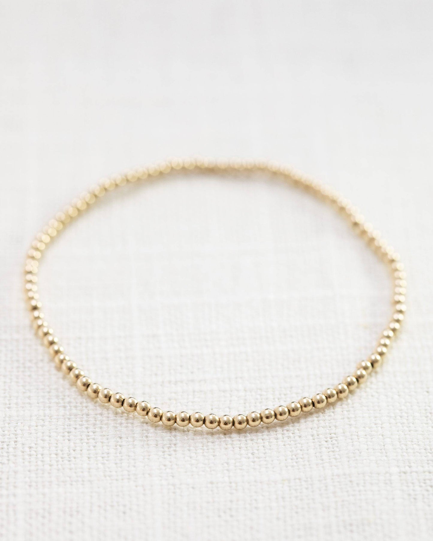 2mm guldklot armband