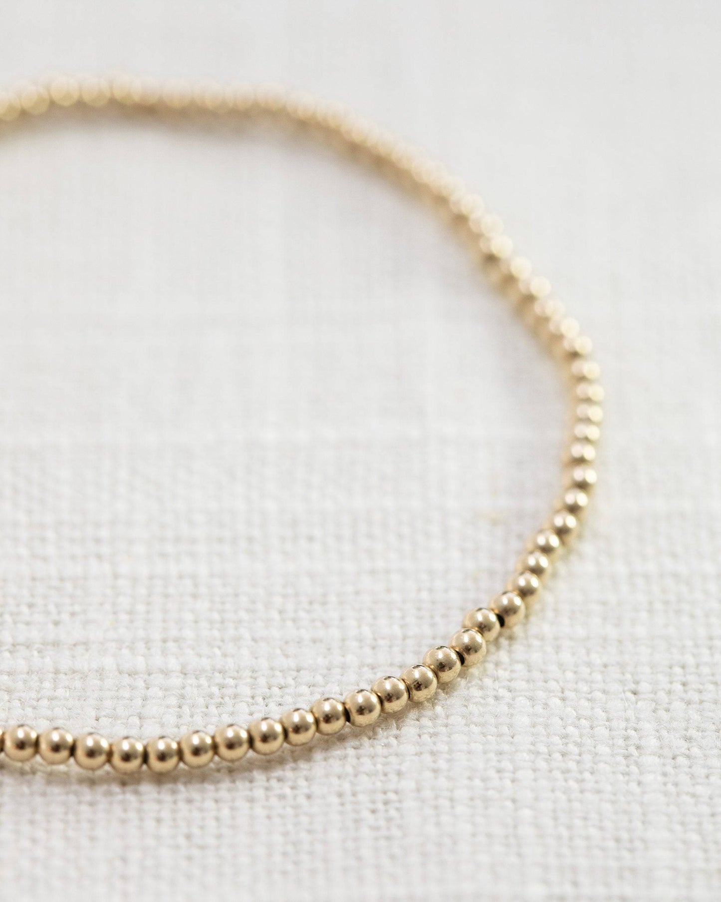2mm guldklot armband