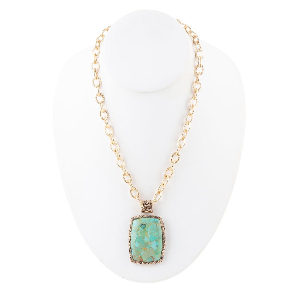 Collana con pendente jacquard blu turchese dorato