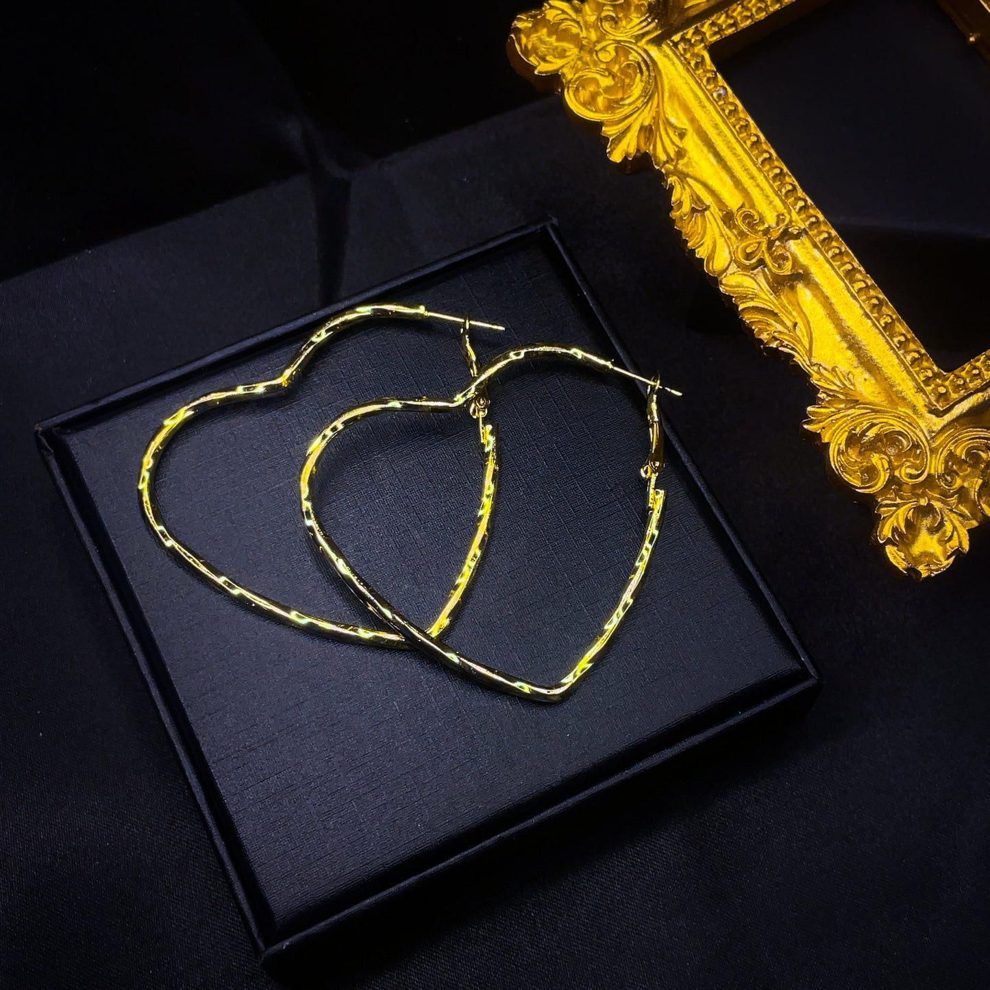 Kolczyki koła Twisted Heart
