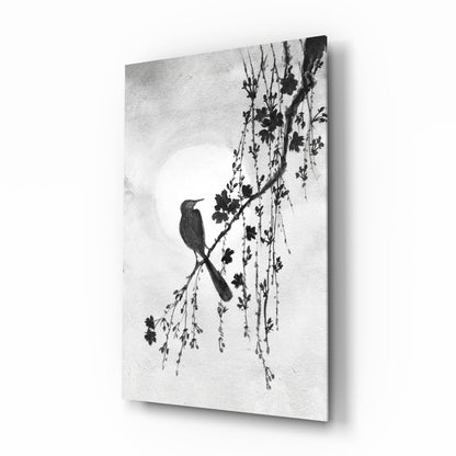 Glass print with black and white bird and floral design on a textured background