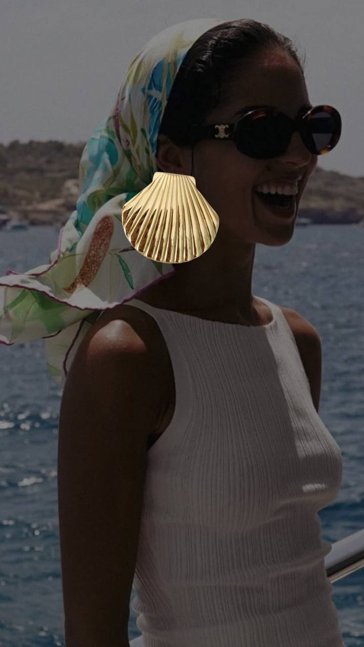 LUCENTEZZA DI CONCHIGLIA MARINA