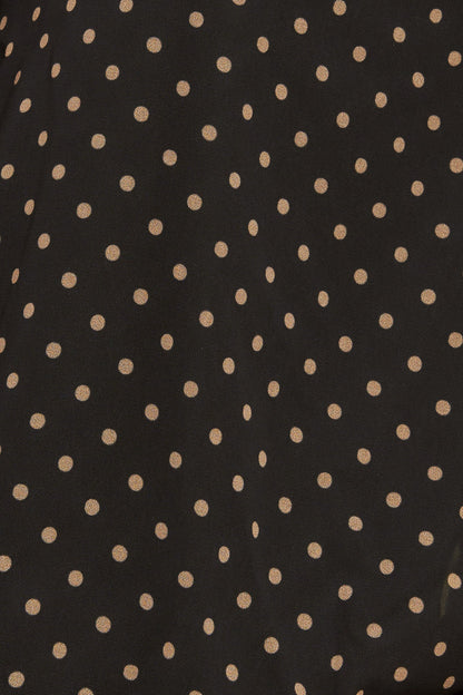 Top intrecciato chic a pois di mezzanotte