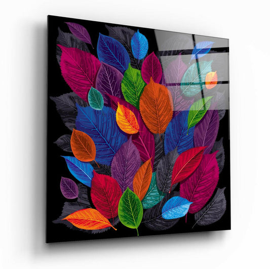 Arte de pared en vidrio negro con collage de hojas en tonos joya