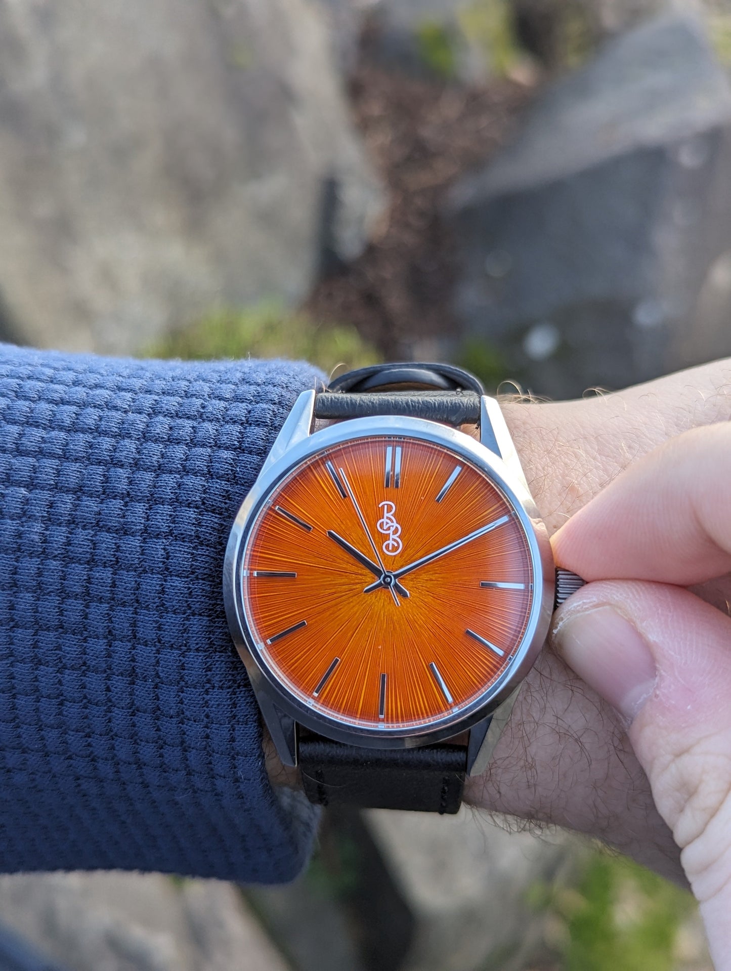 Pomarańczowy zegarek Sunburst
