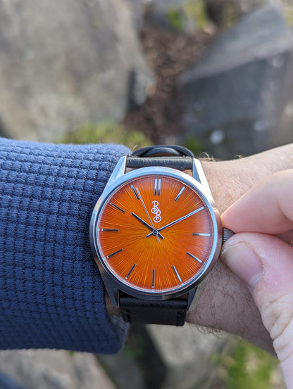 Pomarańczowy zegarek Sunburst