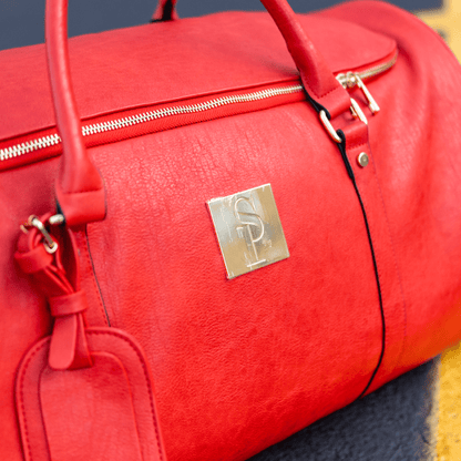Bolso de fin de semana de cuero rojo envejecido