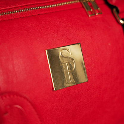 Bolso de fin de semana de cuero rojo envejecido
