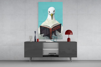 Œuvre murale en verre représentant une mouette lisant un livre sur fond Turquoise