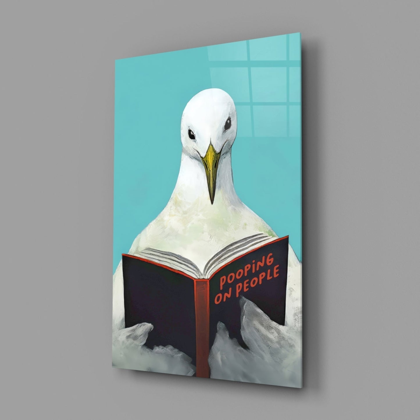 Œuvre murale en verre représentant une mouette lisant un livre sur fond Turquoise