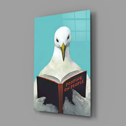 Œuvre murale en verre représentant une mouette lisant un livre sur fond Turquoise