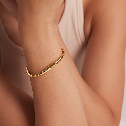 Twisted Gold Bangle Bracelet | Hypoallergenic Stainless Steel with 18k Gold Finish 1
