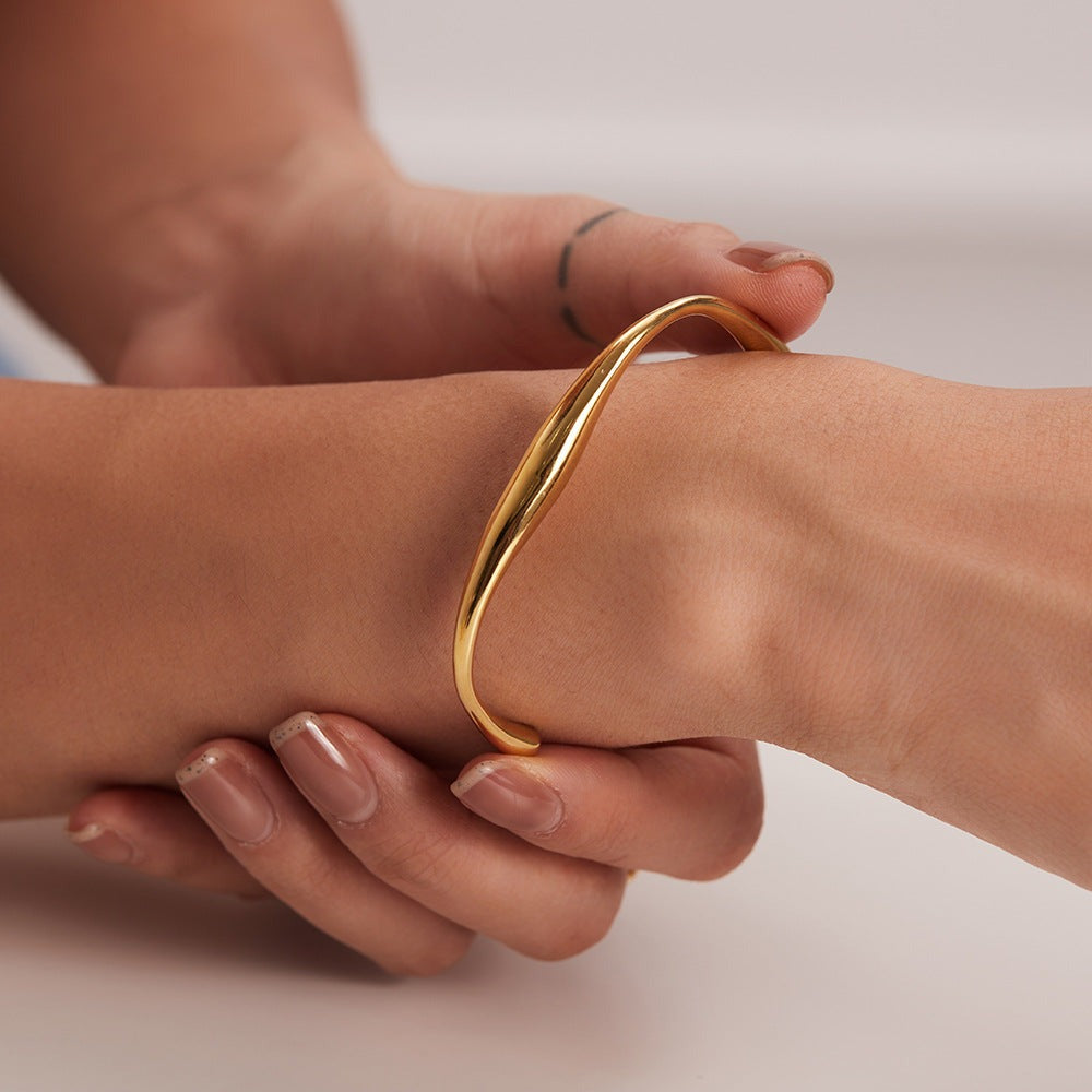 Twisted Gold Bangle Bracelet | Hypoallergenic Stainless Steel with 18k Gold Finish 2