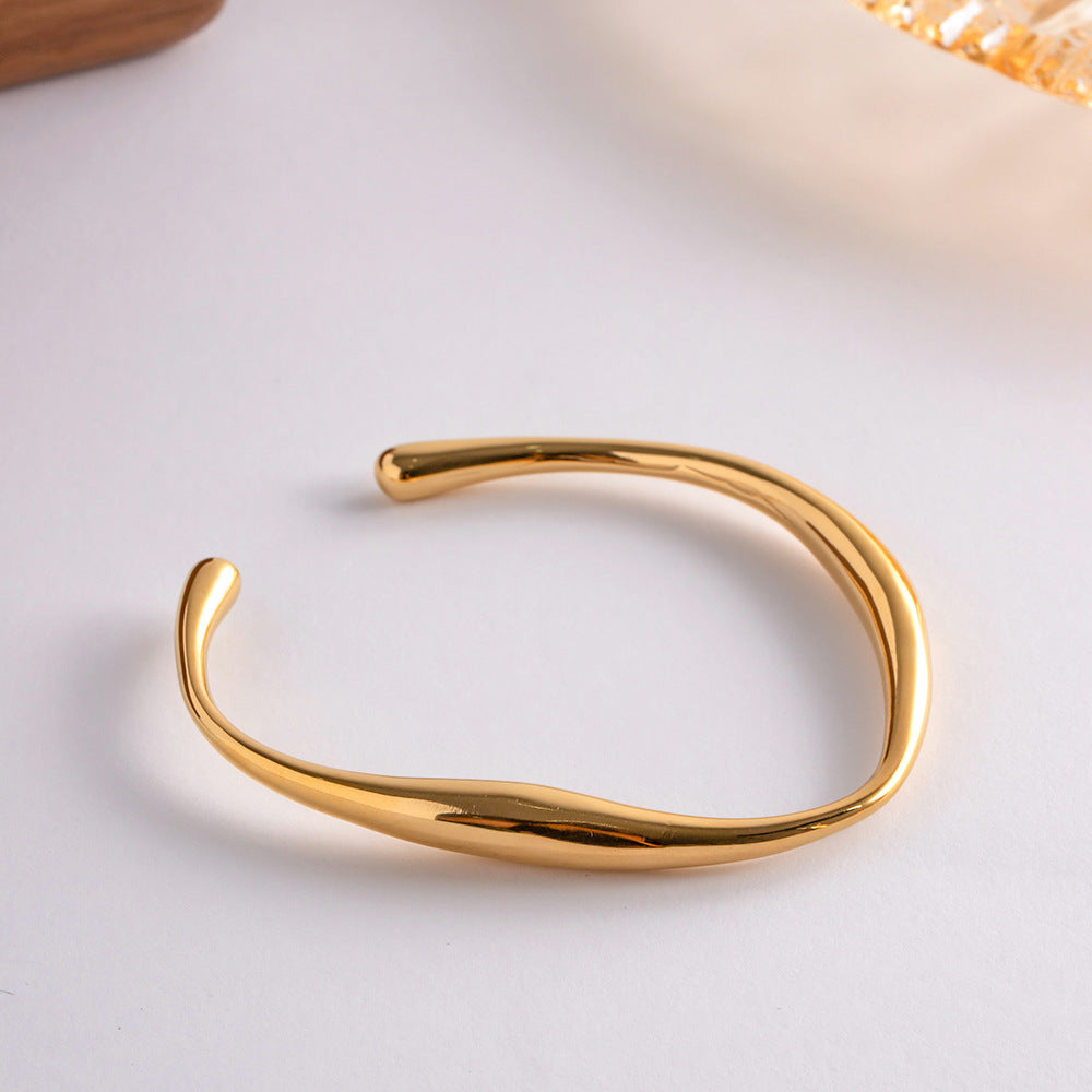 Twisted Gold Bangle Bracelet | Hypoallergenic Stainless Steel with 18k Gold Finish 3