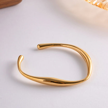Twisted Gold Bangle Bracelet | Hypoallergenic Stainless Steel with 18k Gold Finish 3