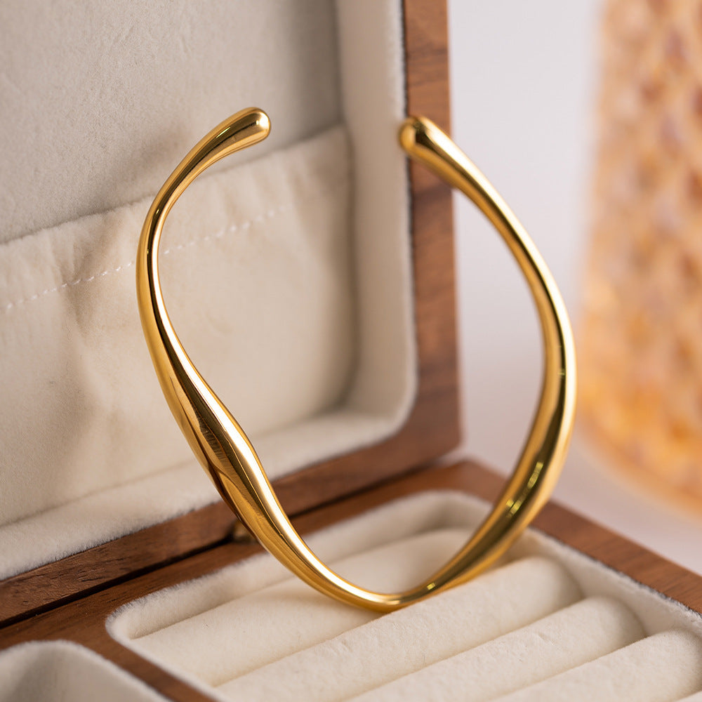Twisted Gold Bangle Bracelet | Hypoallergenic Stainless Steel with 18k Gold Finish 4
