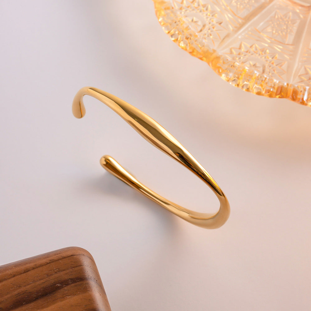 Twisted Gold Bangle Bracelet | Hypoallergenic Stainless Steel with 18k Gold Finish 6