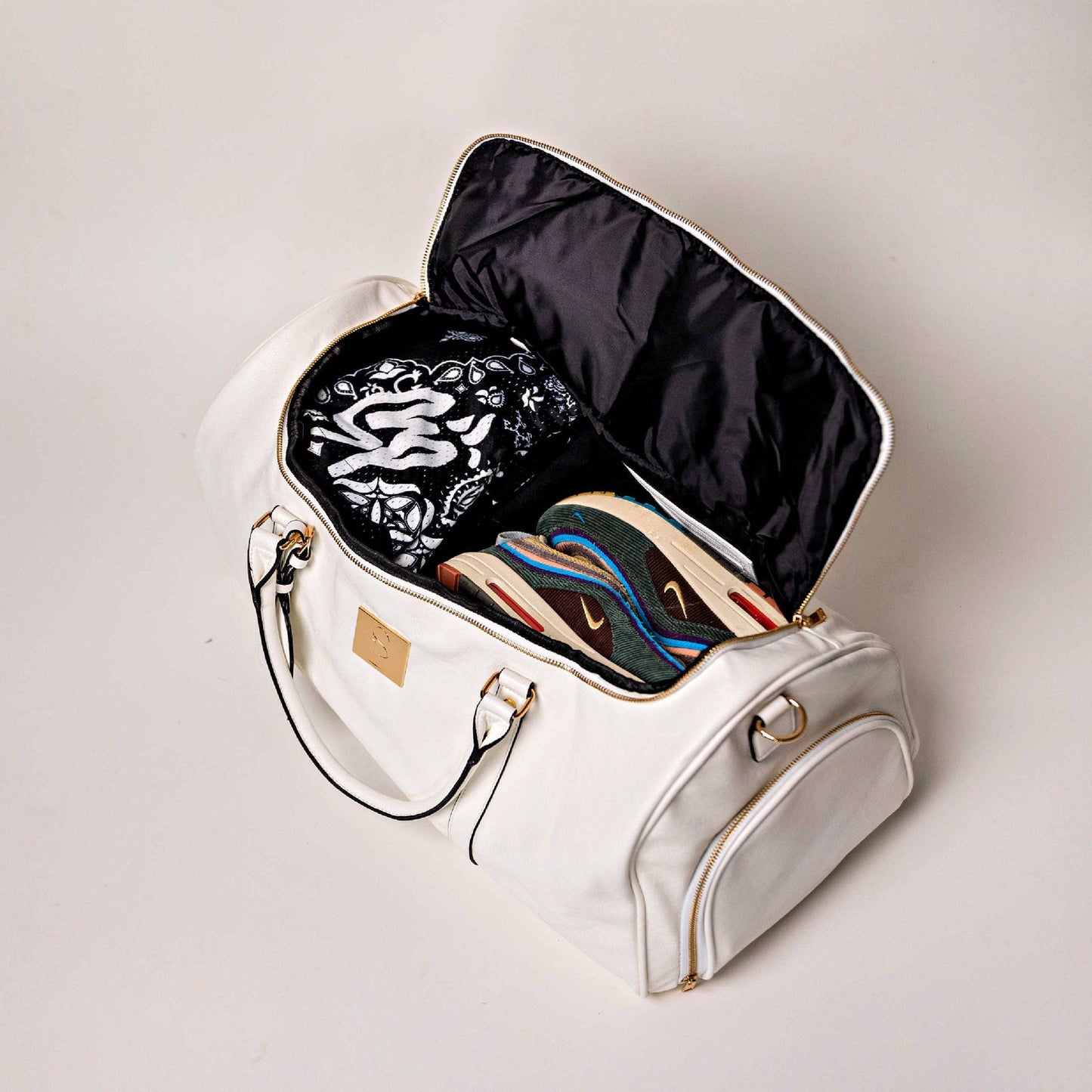 Sac de voyage en cuir blanc de type weekender