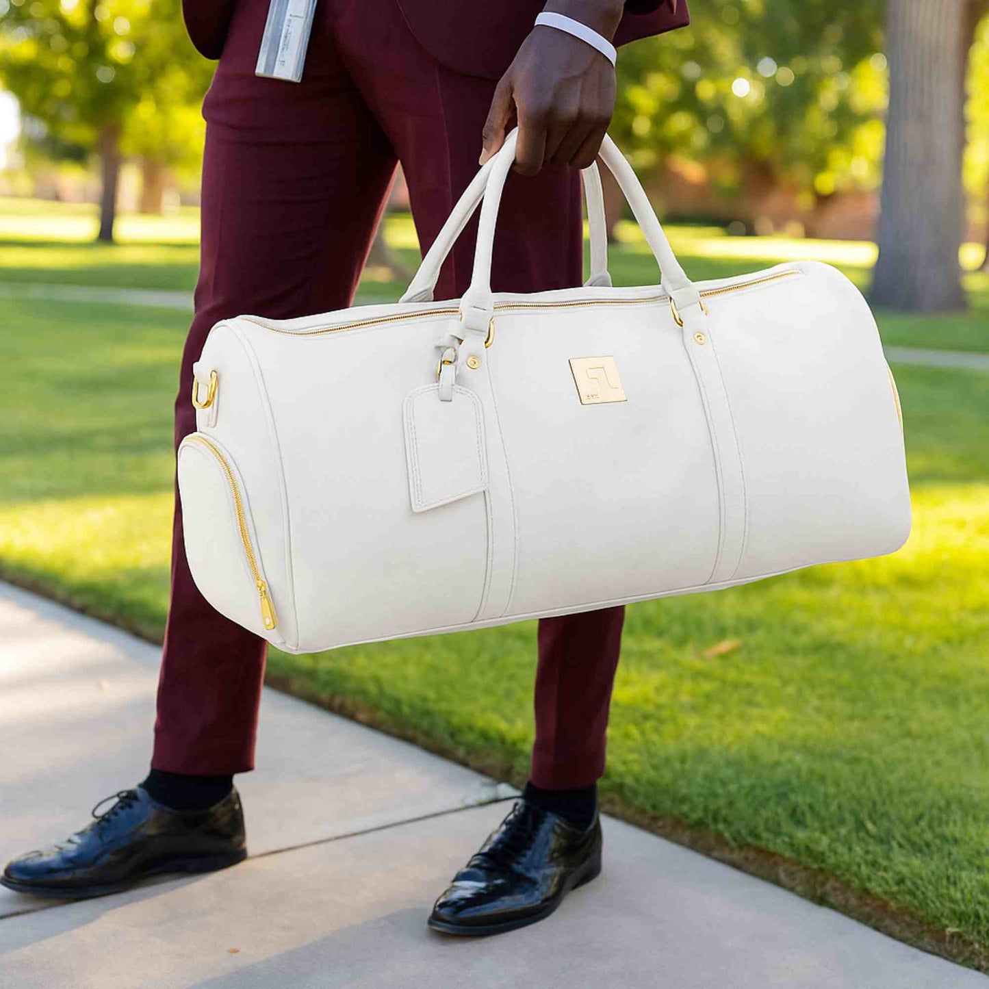 Sac de voyage en cuir blanc de type weekender