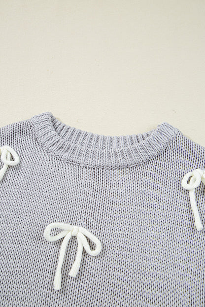 Sweter Sara z aplikacją i rękawami typu cap z kokardą