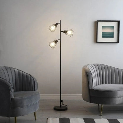 Svart och justerbar golvlampa i metall för rustika och moderna utrymmen