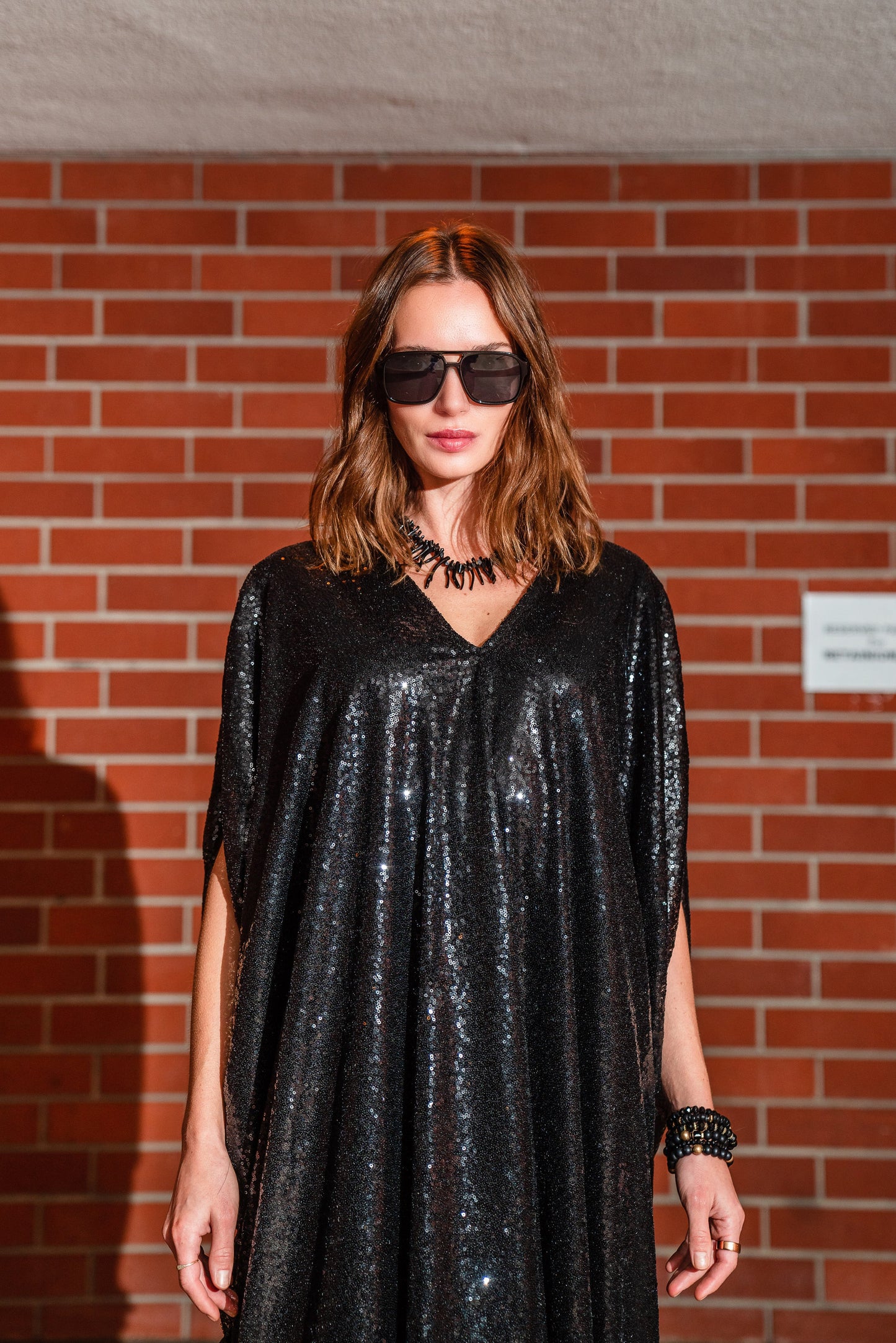 Svart paljett kaftan kjole