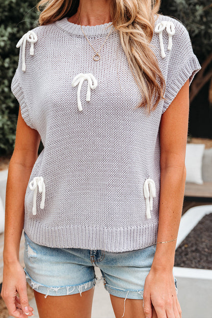 Sweter Sara z aplikacją i rękawami typu cap z kokardą