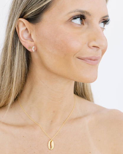 Halsband med guldkowrie