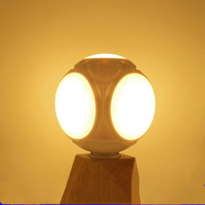 Kompakt hopfällbar bollampa med fotbollsform och LED-glöd