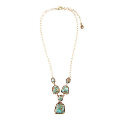Collana dorata con turchese blu cielo e terra