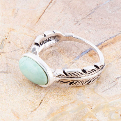 Anello in argento sterling e turchese verde piuma
