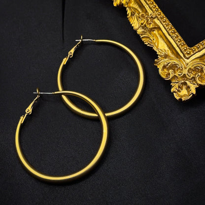 Orecchini a cerchio opachi color oro