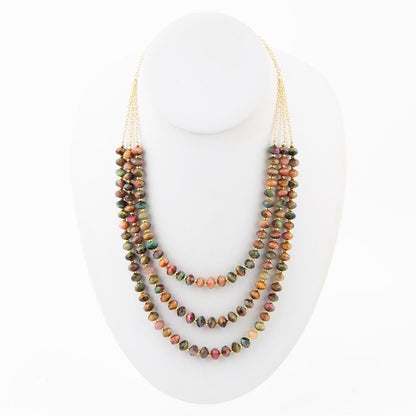 Collana dorata a triplo filo con occhio di tigre multicolore incastonato