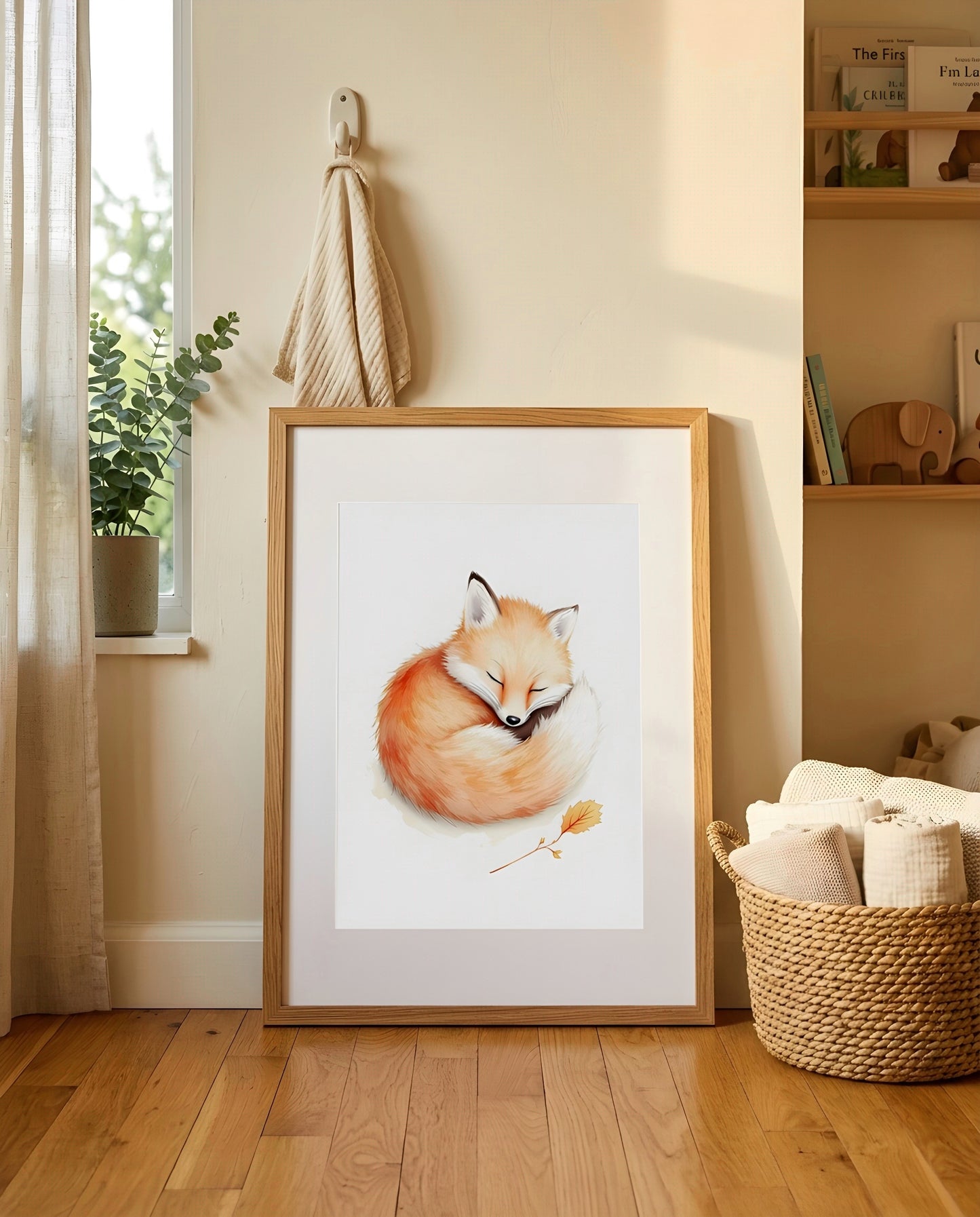 Nursery Baby Fox Soft Watercolor Minimal Printable Wall Art — leaning against a light wall in a nursery setting