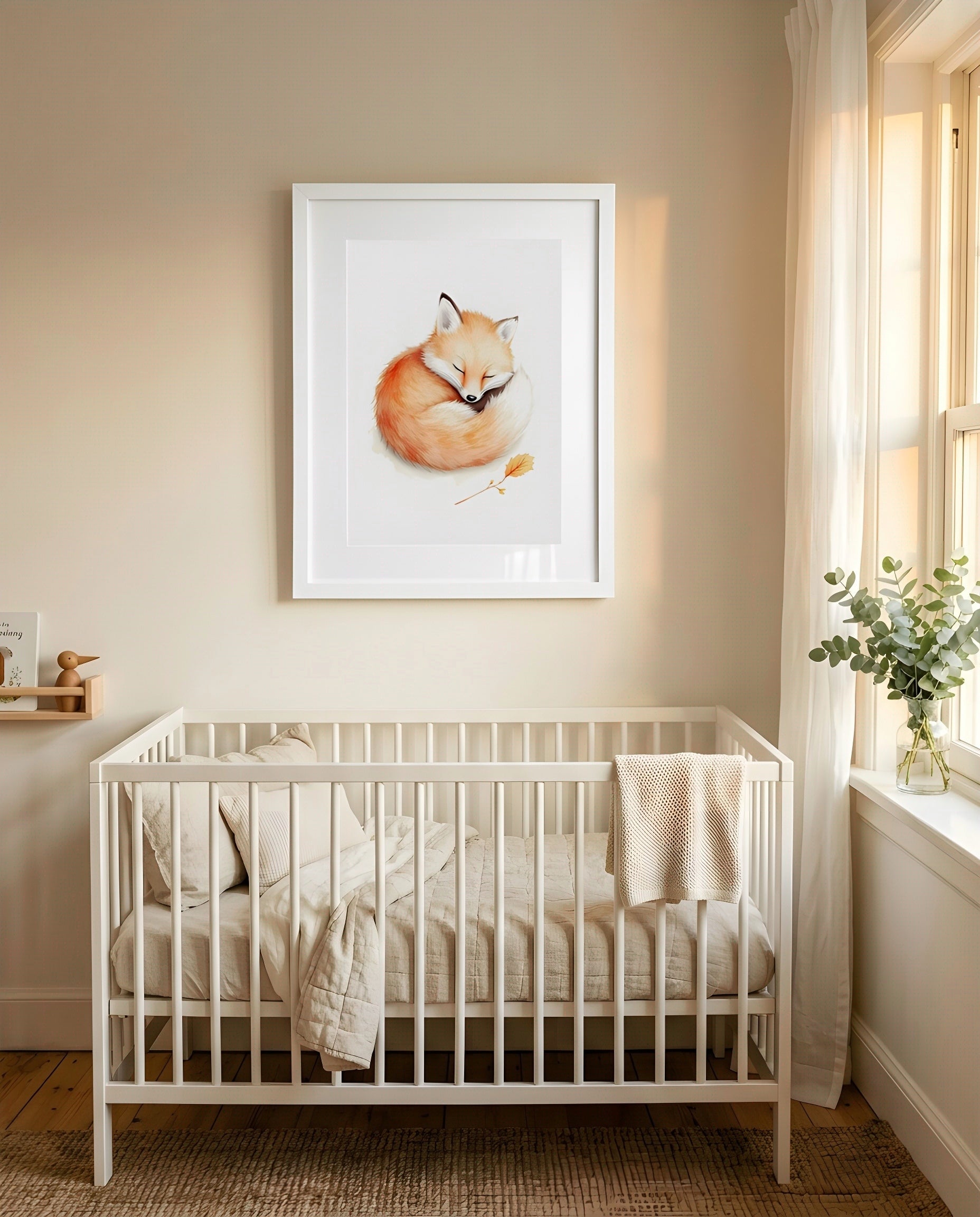 Nursery Baby Fox Soft Watercolor Minimal Printable Wall Art — framed in white above a crib in a softly lit nursery
