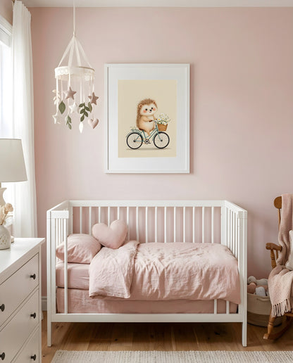 Nursery Retro Flat Hedgehog Bicycle Printable Wall Art — framed in white above a crib in a softly lit nursery