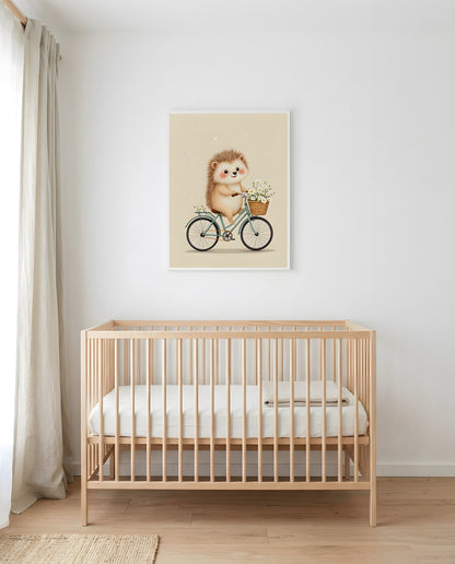 Nursery Retro Flat Hedgehog Bicycle Printable Wall Art — framed in white above a crib in a softly lit nursery