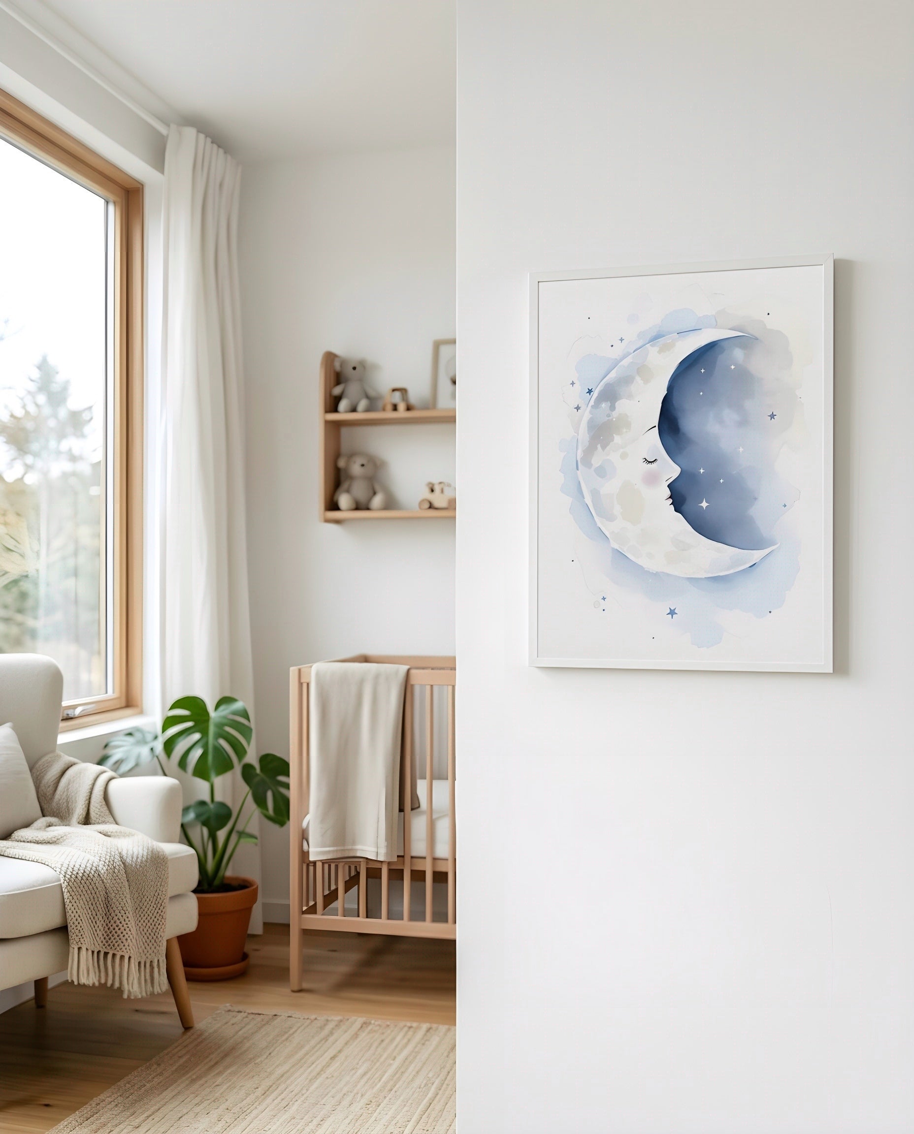 Nursery Sleeping Moon Soft Watercolor Minimal Printable Wall Art — displayed beside a window in warm natural light