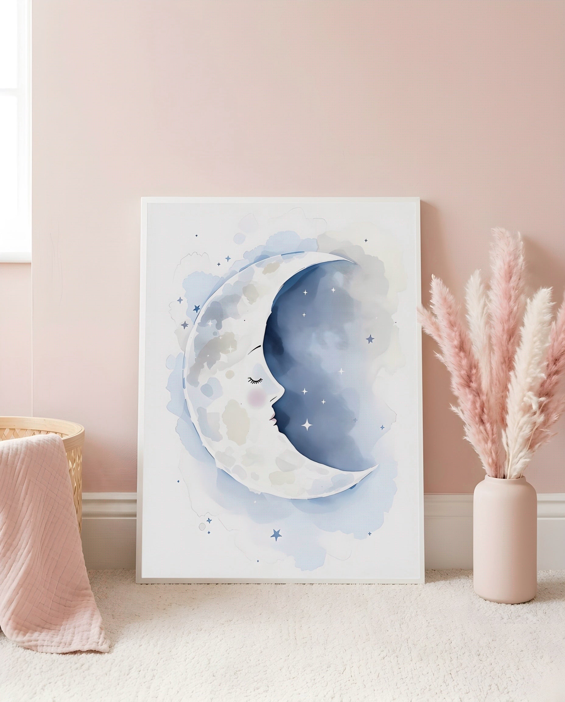 Nursery Sleeping Moon Soft Watercolor Minimal Printable Wall Art — leaning against a light wall in a nursery setting