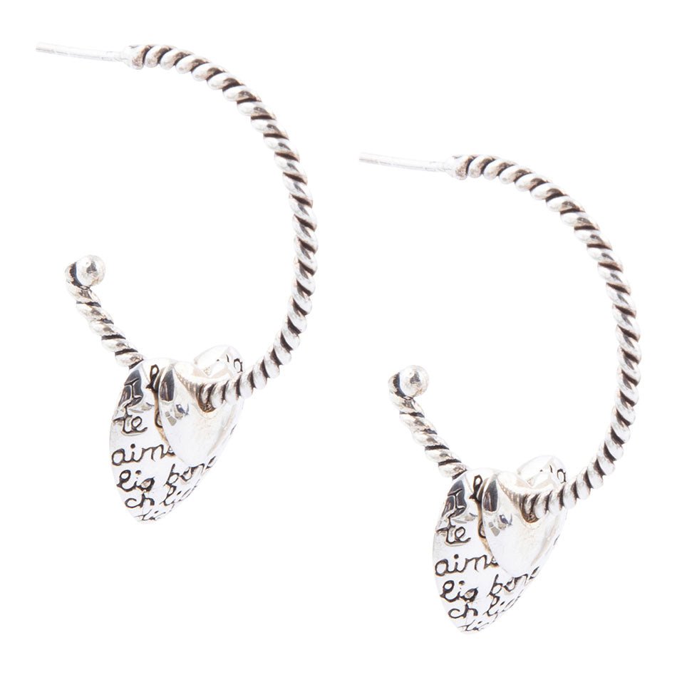Orecchini a cerchio con cuore inciso in argento sterling