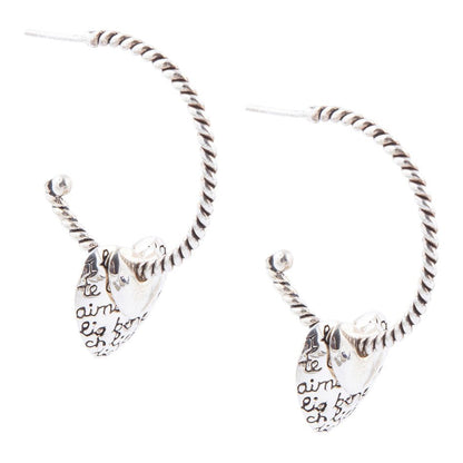 Orecchini a cerchio con cuore inciso in argento sterling