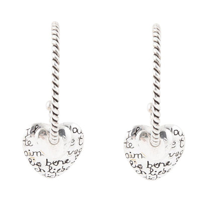 Orecchini a cerchio con cuore inciso in argento sterling