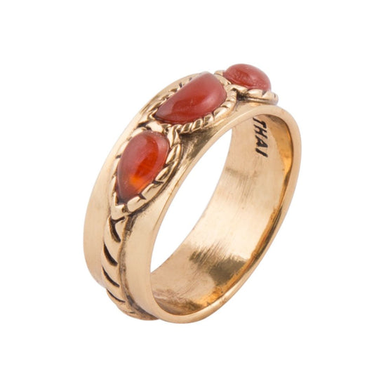 Anello d'oro con corniola arancione a tre pietre